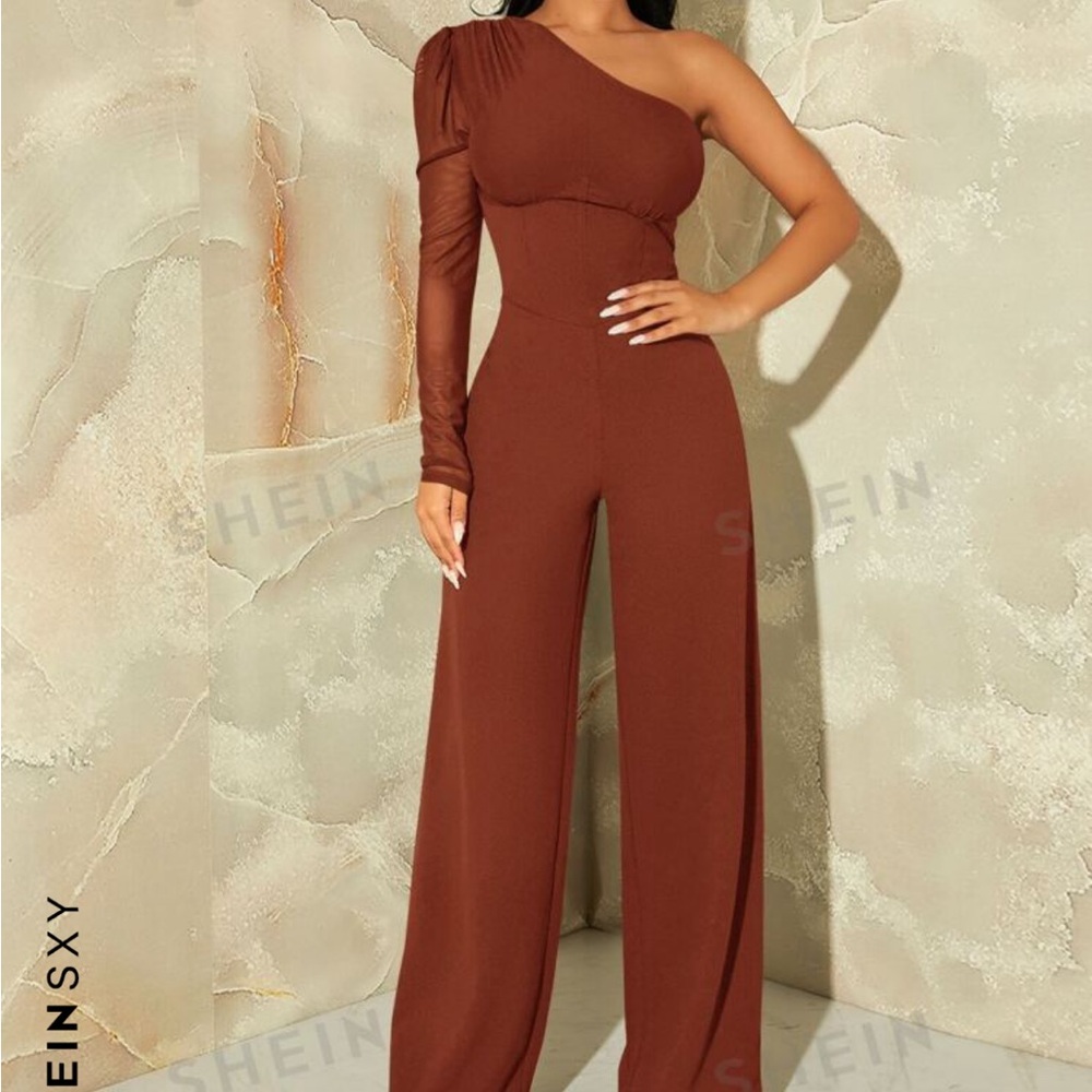 Jumpsuit. Size large. True to size. Not too long.